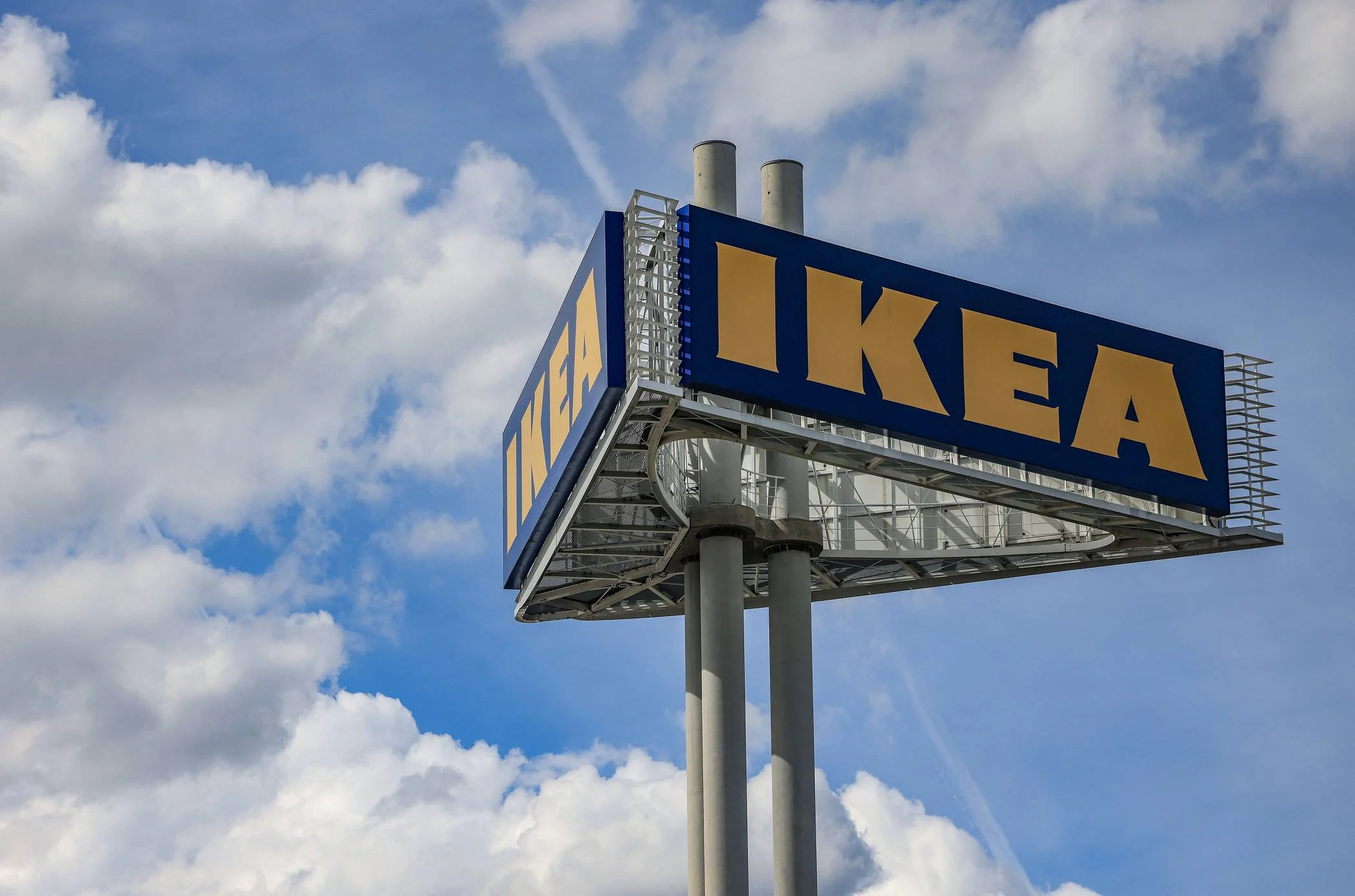 IKEA storefront billboard highlighting price cuts